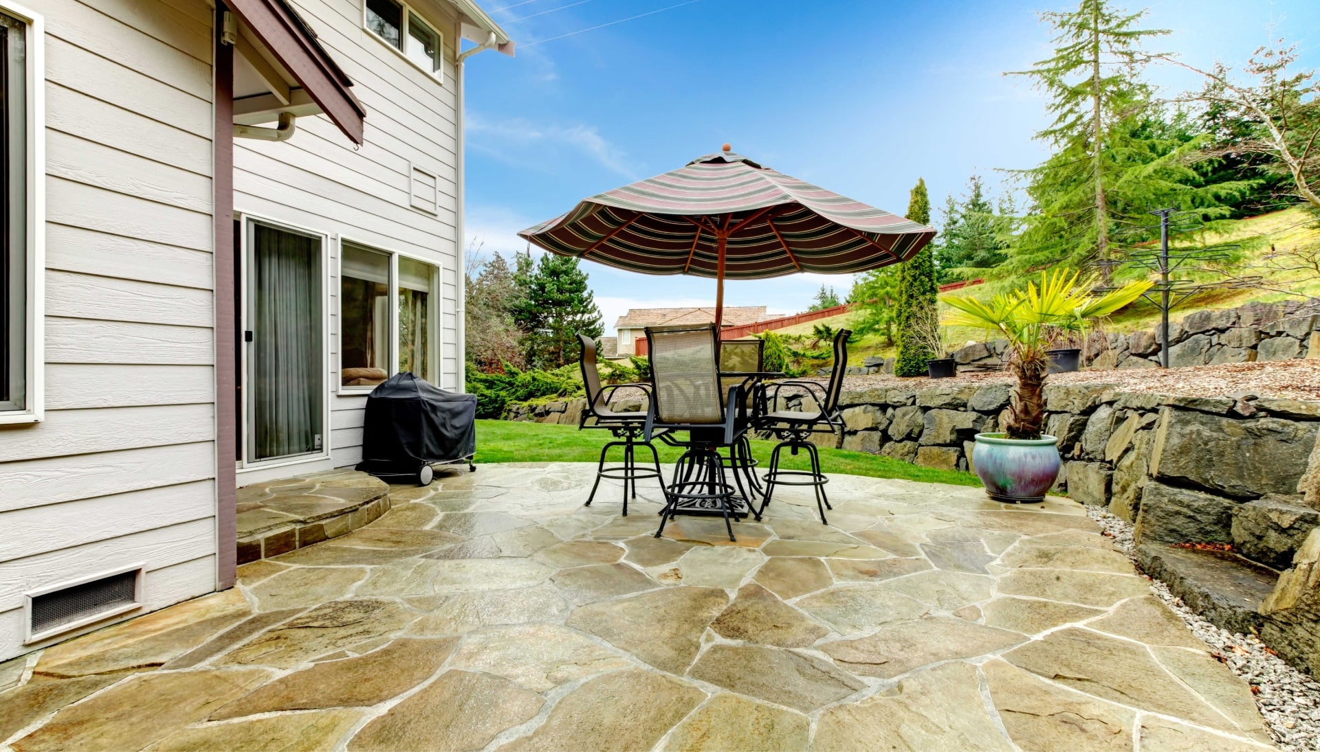 Create an Outdoor Oasis with Stunning Concrete Patio in Racine, WI - Enjoy Beautifully Textured and Patterned Concrete Surfaces for Your Entertaining and Relaxation Needs.