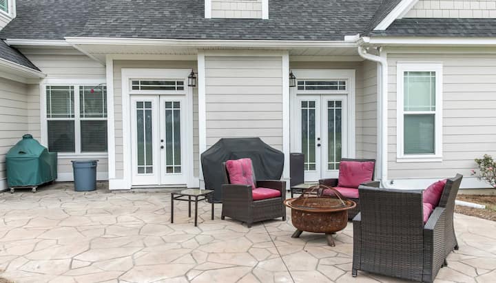 Elevate Your Outdoor Living Space with Stunning Stamped Concrete Patio in Racine, WI - Choose from a Variety of Creative Patterns and Colors to Achieve a Unique and Eye-Catching Look for Your Patio with Long-Lasting Durability and Low-Maintenance.